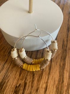 Silver 🌿Bohemian Style Hoops Creating handmade unique meaningful jewelry pieces designed to inspire you! Visit my shop https://Create2inspireOne.Etsy.com  🌟Details & Material:  *Silver Hoop Earrings  *Heishi Clay Beads mixed: beige, tan & mustard  *Gold flat focal beads *Earring Card included  *Silicone Backs included  *Jewelry Box Included  Create2inspireOne jewelry makes for a special occasion, great birthday gift, a friend, loved one,  anniversary gift- the shock on your partners face when Yellow Hoop Earrings For Festival, Adjustable Single Wrap Bohemian Earrings, Bohemian Adjustable Single Wrap Earring, Adjustable Bohemian Single Wrap Earring, Adjustable Single Bohemian Wrap Earring, Everyday Small Hoop Bohemian Earrings, Bohemian Round Hoop Earrings For Everyday, Bohemian Small Hoop Earrings For Everyday, Bohemian Hoop Wrap Earrings