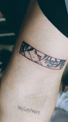 a woman's leg with a tattoo on it that has an image of a boat in the water