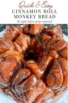 cinnamon roll monkey bread on a plate with text overlay that reads quick and easy cinnamon roll monkey bread