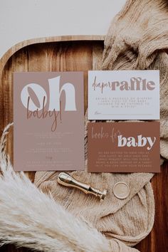 some type of business cards on top of a wooden tray with fur and other items