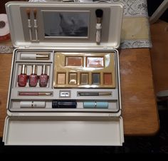 "A complete, 1980's, Estee Lauder make up kit in it's original hard plastic box. It is all there and never used. Looks brand new. Has original, never used, two \"Make Up Applicators\", a Make Up Brush, six different color \"Pressed Eyelid Shadows\", three \"Polished Performance Nail Lacquers\", one \"Eye Contouring Pencil\", one \"Perfect Line Lip Pencil\", a \"Luscious Creme Mascara\", the original \"Pencil Sharpener\", never used, three lipsticks, one \"Spiced Apple\", one \"Rose Diamond\" and 80s Makeup Products, 1980 Makeup, Discontinued Makeup, 80s Makeup, Makeup Pallets, One Rose, Makeup Box, Vintage Cosmetics, Clean Makeup