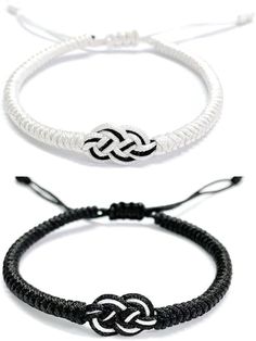 three different bracelets with black and white cords on each side, one has an intertwined