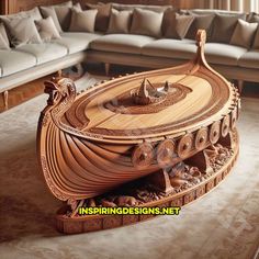 an intricately carved wooden table in the middle of a living room