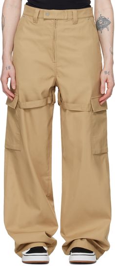 Cotton gabardine cargo pants. · Belt loops at waistband and inseams · Five-pocket styling · Zip-fly · Cinch strap at legs · Flap pocket at outseams · Embroidered logo patch at back waistband Supplier color: Beige Cargo Pant, Flap Pocket, Bottoms Pants, Cargo Pants, Patch Logo, Apparel Accessories, Womens Bottoms, Relaxed Fit, Outfit Accessories