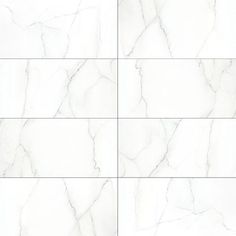 four white marble tiles with different angles and sizes, all showing the same pattern in each tile