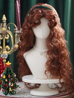 Indulge in the festive spirit with our Long Wavy Wig! Designed with voluminous and fluffy curls, this wig adds an extra touch of elegance to your holiday look. The fluffy crown and curled bangs work together to create a smaller, more delicate face appearance, enhancing your overall charm. Perfectly suited for Christmas outfits, this wig is a must-have accessory for the season.  Please note, the price includes only one wig.   	 		 			Size 			Free Size 		 		 			Length 			75 Long Fluffy Curly Hair, Wavy Wig Hairstyles, Curly Ginger Wig, Paula Young Wigs, Merida Wig, Fluffy Long Hair, Ginger Wigs, Styled Wigs, Belle Wig