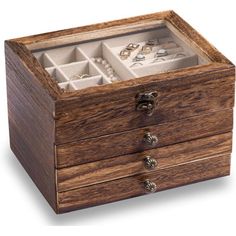 an open wooden box with jewelry in it