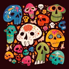 a group of skulls with different colored faces