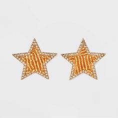 pair of gold and diamond star earrings