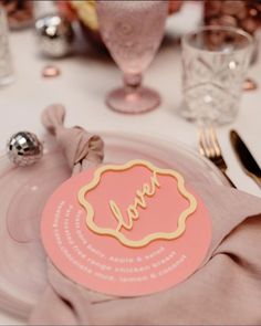 a place setting with napkins and silverware