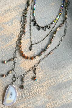 Five layer necklace with unique multi colored beads. A glass agate like pendant. Lobster claw closure. Bold Type, Vibe Tribe, Hippie Vibes, Blouse Tank Top, Layer Necklace, Bathing Suit Covers, Hippie Jewelry, Kids Sale, Maxi Dress Party