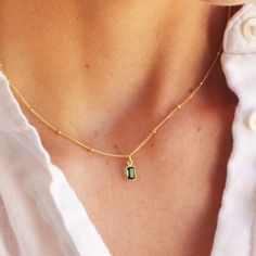 "Some classics never go out of style. Our dainty baguette necklace adds a touch of color and can be dressed up or down! Add a little sparkle to your dainty jewelry collection with this delicate 14kt gold filled necklace. D E T A I L S *Quartz baguette *9mm, choose pink, green or brown *100% 14kt gold filled chain Wonderful for layering! LENGTH *Available in 16, 18 or 20 inches *Model is wearing 16\" in photos HOW TO PERSONALIZE *Select your choices from the drop down menu to create your custom d Necklaces For Her, Layer Jewelry, Jewelry 2023, Baguette Necklace, Gold Filled Necklace, Money Aesthetic, Large Gift, Layered Jewelry, Message Box