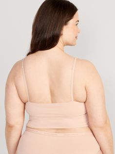 adjustable straps scoop neck 2-ply shelf bra provides light support for a-c cups fitted hits just below ribcage XS = 34A, 32B cup sizes; S = 32C, 34B, 36A cup sizes; M = 34C, 34D, 36B, 36C, 38B cup sizes; L = 34D, 34DD, 36C, 36D, 38B, 40B cup sizes; XL = 38DD, 40D, 40DD cup sizes; XXL = 42D, 42DD cup sizes.  models are approx.  5'9" and wear sizes s (4), l (12), and xl (18)machine wash according to the care instruction label Plus Size, Old Navy, Brami Top, Top Hits, Cup Sizes, Rib Cage, Shelf Bra, Adjustable Straps, Scoop Neck