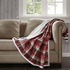 a couch with a blanket on top of it