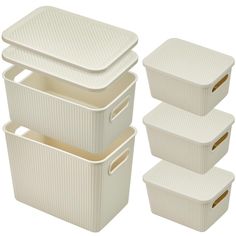 four white storage containers with lids on top and bottom, all lined up against one another