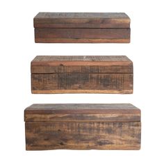 three wooden boxes sitting on top of each other