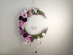 a flower wreath hanging on the wall