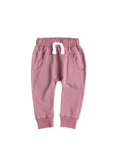 Get ready for fall with our best-selling joggers, now available in the perfect shade of pink. Perfect for the season, our joggers are crafted with premium materials for lasting comfort and durability. Material + Wash 95% Cotton 5% Spandex Machine Wash Cold Non Chlorine Bleach When Needed Tumble Dry Low Warm Iron if Necessary Do Not Dry Clean Size + Fit: True to Size Classic Fit Academy Uniforms, Get Ready For Fall, Adult Pajamas, Kids Jogger, Newborn Romper, Pre Fall Collection, Ready For Fall, Mauve Color, Romper With Skirt