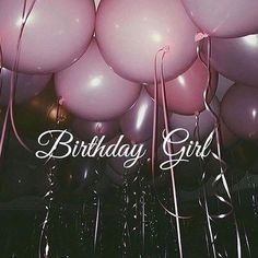 a bunch of balloons with the words birthday girl written on them in white and pink