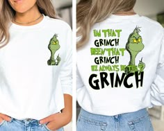 a woman wearing a white shirt with the words grinch on it