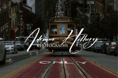 an image of a cable car going down the street with words above it that read, annna albers photography