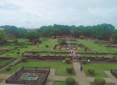 an aerial view of a large garden with lots of trees