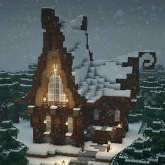 a very nice looking house in the middle of some snowy trees and snow covered ground