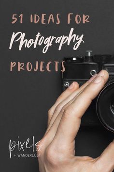 a person holding up a camera with the words 51 ideas for photography projects