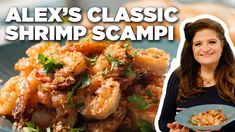 a woman holding a plate with shrimp on it and the words alex's classic shrimp scampi