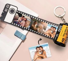 a camera keychain with two pictures attached to it, and a film strip