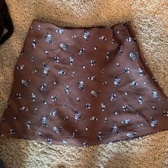 This Is A Small Mini Skirt Perfect For Summer!! Never Worn!!!! Brown Lined Mini Skort, Brown Skirt For Spring, Brown Spring Skirt, Casual Brown Mini Skirt For Day Out, Trendy Brown Skirted Bottoms, Casual Brown Mini Skort, Casual Brown Mini Length Skort, Trendy Brown Skort For Spring, Spring Mini Skirt In Brown