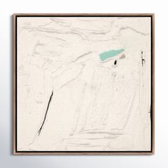 an abstract painting with white and blue paint on the bottom, in a wooden frame