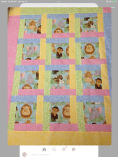 a baby quilt with animals on it is displayed in an appliance screen shot