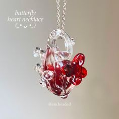 Handmade lampwork wine red clear glass butterfly anatomical heart bead pendant, comes with an adjustable necklace chain. The pendant in the image is exactly what you'll receive. Colour may vary depending on light settings. Approximate measurements: Pendant - max width: 20 x max height:30mm. Sizes may vary. Necklace - length 45cm, adjustable. - Embeaded Studio    (  ̳* * * ̳) /    づ♡ Glass Butterfly, Anatomical Heart, Bead Pendant, Glass Heart, Butterfly Pendant, Adjustable Necklace, Heart Beads, Red Glass, Beaded Pendant