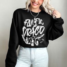 Are you a Dramione lover? This Malfoy crewneck sweater shows the world your favorite version of Malfoy is the fanfic one. This would also make a great gift for dramione lover or gift for Fanfiction Lover. This crewneck is a more heavy duty cotton, more structured, made using the highest quality material for comfortable wear. All of our products are printed with DTG printing in ultra high quality to ensure beautiful graphics on our Gildan 18000. PRODUCT DETAILS: ~ Loose fit - Runs true to size - Slytherin Shirt, Dtg Printing, Crewneck Sweater, Crew Neck Sweater, Unisex Sweatshirt, Fanfiction, Sweat Shirt, Fabric Weights, Heavy Duty