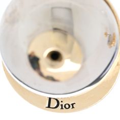 This is an authentic pair of CHRISTIAN DIOR Mise En Dior Tribal Earrings in Gold and Silver. These delightful double-headed stud earrings are worn with the smaller gold stud in front, leaving the larger split gold and silver orb to cleverly dangle behind and under the ear lobe. Dior Earrings, Earrings Rose Gold, Dior Jewelry, Earrings In Gold, Gold Stud, Rose Earrings, Rose Gold Earrings, Gold Studs, Gold And Silver