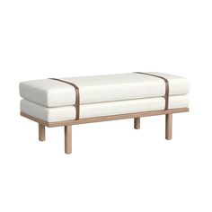 a white bench with two brown straps on the bottom and one seat upholstered