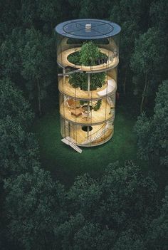 an aerial view of a tree house in the woods