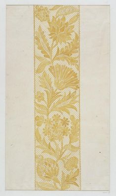 an image of a yellow and white wallpaper with floral designs on it's border