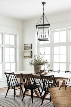 the instagram page shows an image of a dining room table with chairs and baskets on it