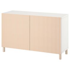 a white cabinet with wooden slats on the front and bottom, against a white background