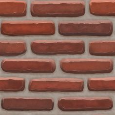 a brick wall that is made out of red bricks and has some brown paint on it