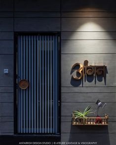 the entrance to an office building with a sign that reads, amritshi design studio