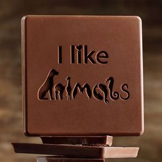 a chocolate sign that says i like animals