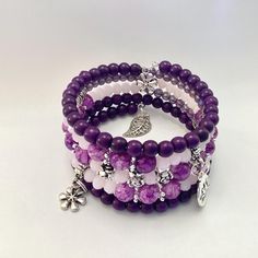 Pretty purple beaded wire wrap bracelet The bracelet fits all wrist sizes and depending on your wrist size will depend on how many times it will wrap Diameter 60mm - 65mm Thank you for visiting my shop. If there is a particular piece you like but would prefer it in another colour, shortened or lengthened please contact me I can usually meet your requirements  PLEASE MAKE SURE YOUR SHIPPING ADDRESS IS CORRECT If you are purchasing this listing as a gift I can send direct to the recipient for you Purple Beaded Bracelets, Wire Wrap Bracelet, Purple Beaded, Memory Wire Bracelet, Wire Wrapped Bracelet, Pretty Purple, Memory Wire Bracelets, Layered Bracelets, Memory Wire