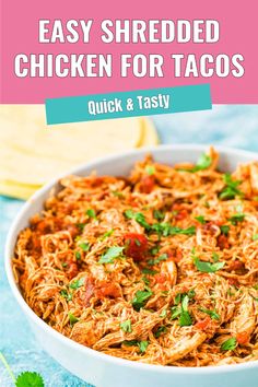 easy shredded chicken for tacos in a white bowl with cilantro on the side