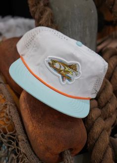 Pre order! Hats should ship in 10 to 14 days roughly! Congrats on being a first batch owner of the brand new limited artist edition hats! COLORWAY: WHITE MATERIAL: NYLON CROWN: MID HEIGHT / SEMI-STRUCTURED PANEL: 5 VENTILATION: PERFORATED HOLE BILL: Flat CLOSURE: SNAP BACK ROPE: ORANGE Cheap Cotton Hats With Graphic Print, Cheap Trendy Summer Snapback Hat, Cheap Curved Bill Snapback Hat For Beach, Affordable Trendy Flat Bill Snapback Hat, Leah Fish Hats, Affordable Summer Snapback Hat With Curved Bill, Cheap Fun Snapback Hat For The Beach, Summer Granola Flat Bill Hats, Flat Bill Granola Hats