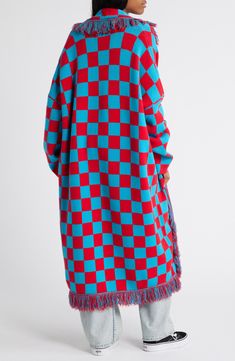 Big, bold style is the name of the game with this oversized cardigan featuring statement-making checkered print and fanciful fringe. 42" length; 2" fringe (size Small/Medium) Open front Shawl collar Long sleeves 50% viscose, 30% polyester, 20% nylon Hand wash, dry flat Imported Dressed In Lala, Fringe Blanket, Blanket Cardigan, Sweet November, Checkered Print, Bold Style, Oversized Cardigan, Shawl Collar, Bold Fashion