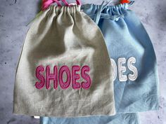 two bags with the word shoes on them