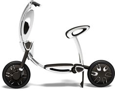 an artisticly designed scooter with wheels on the front and back wheel, viewed from above